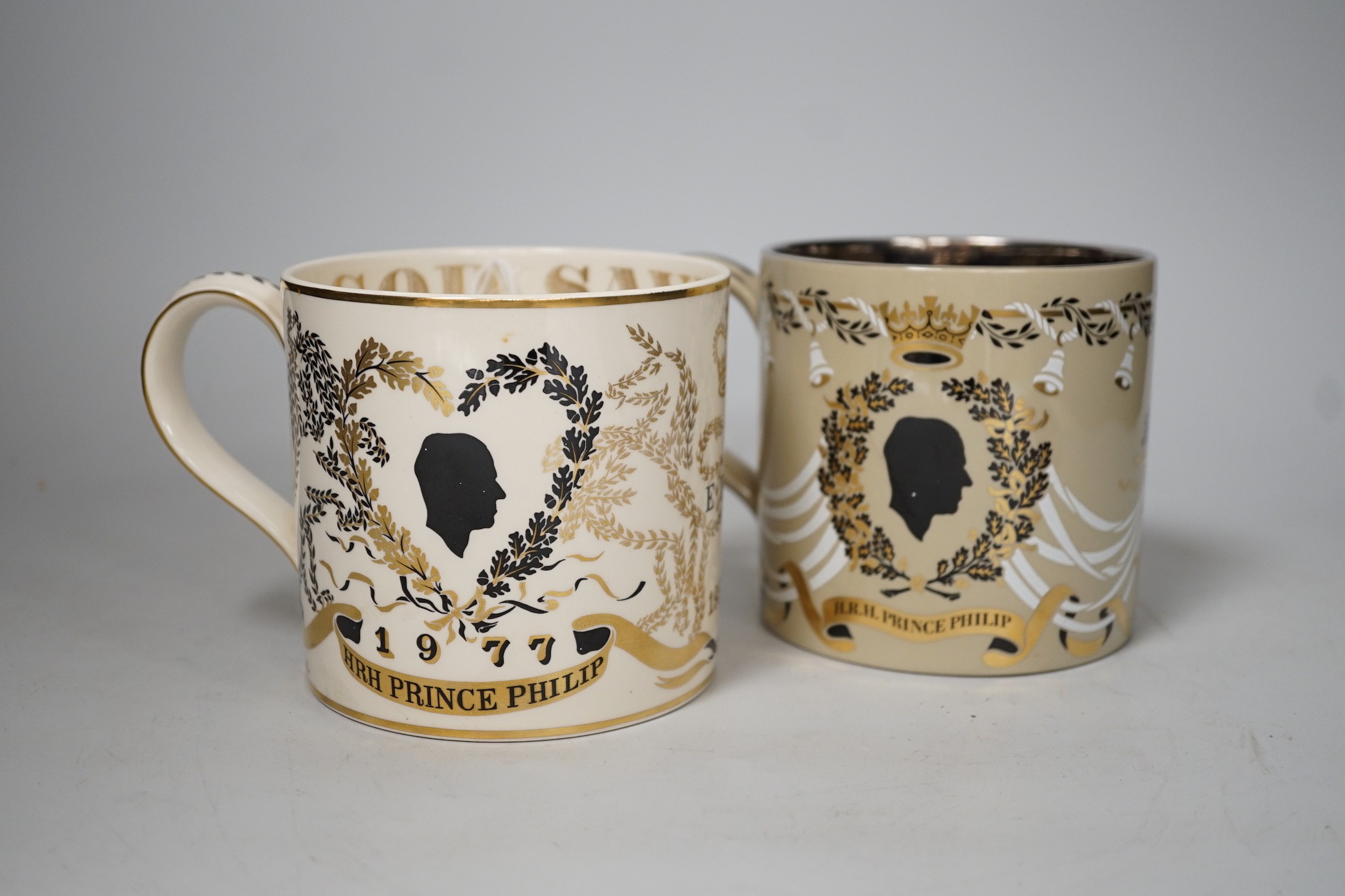 Richard Guyatt for Wedgwood. Two Royal commemorative mugs. Tallest 10.5cm